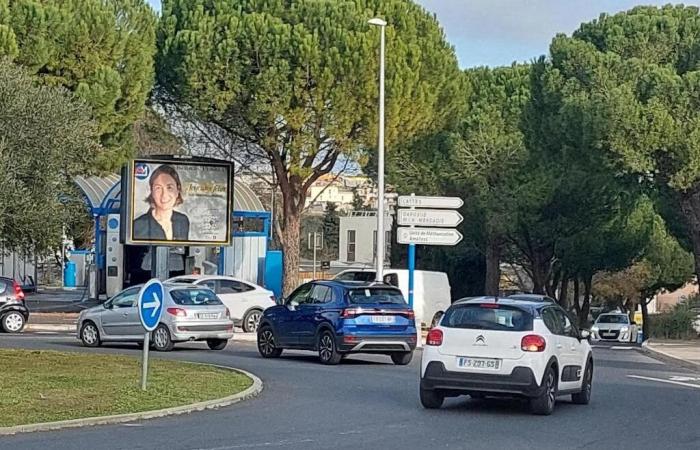 municipal candidate Isabelle Perrein at the top of the poster