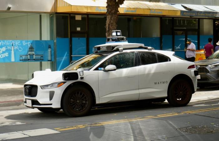 a Waymo autonomous taxi unable to leave a roundabout