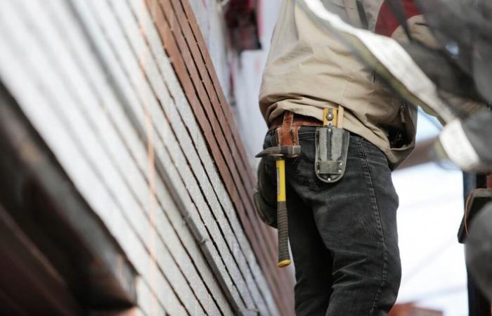 The wooden facade of a recent residence collapses, residents worried