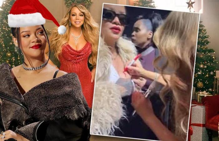 Mariah Carey signs an autograph on Rihanna’s breast