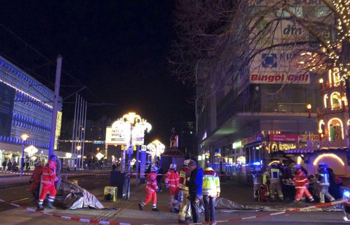 At least 2 dead and dozens injured after car plows into German Christmas market, authorities say