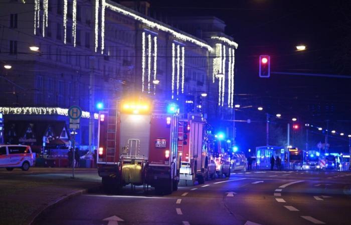 At least 2 dead and dozens hurt after a car drives into a German Christmas market in a suspected attack