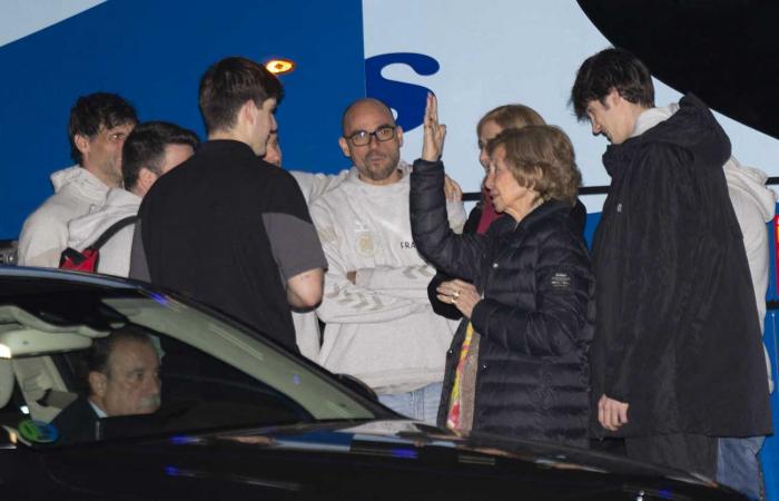 Queen Sofia tenderly encourages her grandson Pablo during his handball match