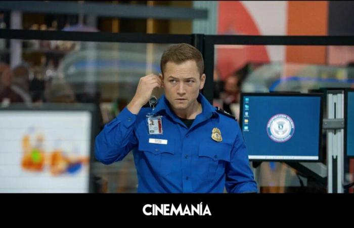 tension at the airport with a suitcase and Taron Egerton in the Netflix Christmas movie