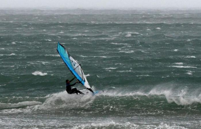 windsurfer found after drifting all night