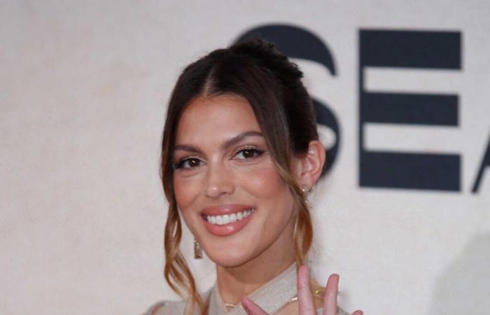 Iris Mittenaere poses in the snow in the mountains