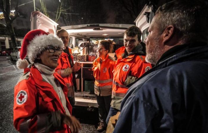 Red Cross marauders celebrate New Year's Eve in the streets with the most deprived