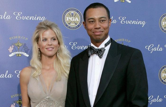 Tiger Woods and his ex-wife Elin Nordegren share an emotional embrace after the golf tournament.