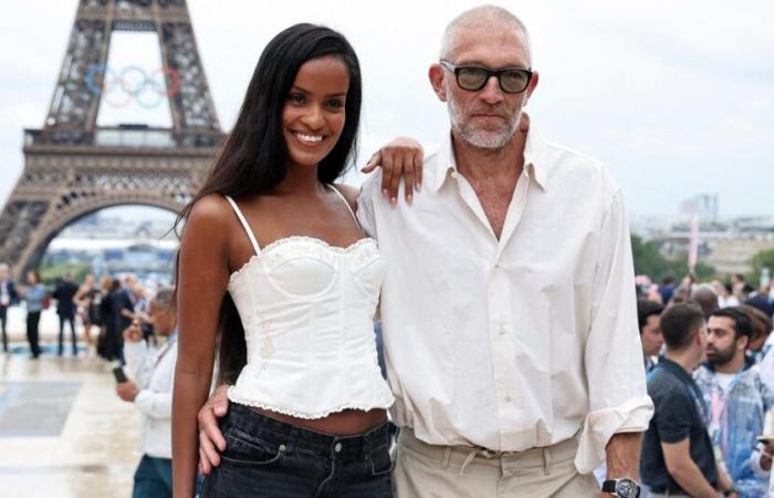 Soon to be a father again at 58, Vincent Cassel poses with his partner Narah Baptista and her baby bump