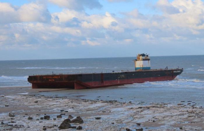 The barge stranded in Sotteville-sur-Mer after the storm has left