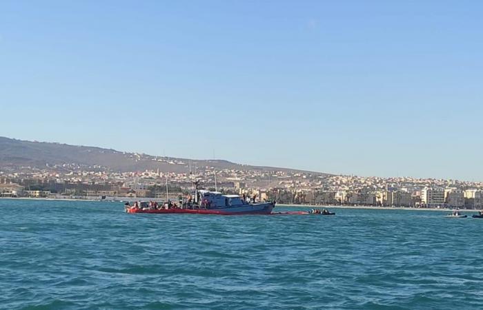 Royal Navy units rescue a patrol boat stranded off the coast of Nador