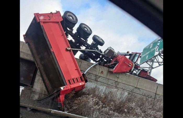 Utica declares snow emergency; dump truck rolls over highway ramp