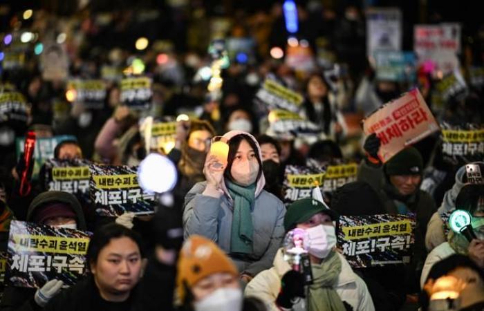 In Seoul, pro and anti-Yoon demonstrators clash in front of his official residence, where he has taken refuge