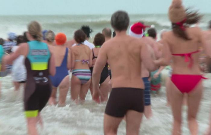 Half-naked in 9-degree water, they bathe for the New Year