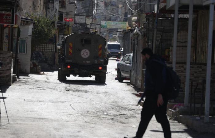 In the West Bank, Palestinian authorities announce one dead and nine injured in an Israeli raid