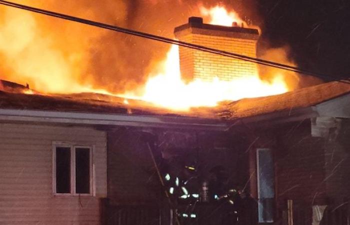 Ten people on the street following a fire in an apartment building in Edmundston