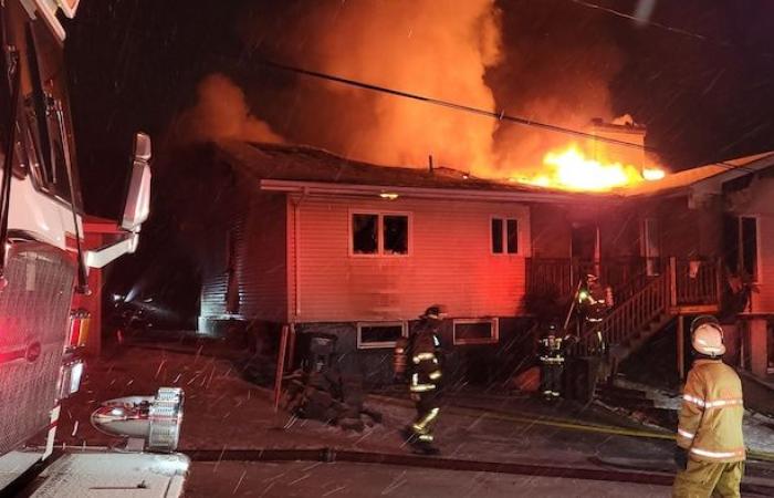 Ten people on the street following a fire in an apartment building in Edmundston