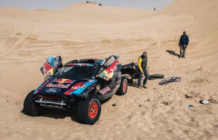 images of Carlos Sainz’s car on the roof after an accident