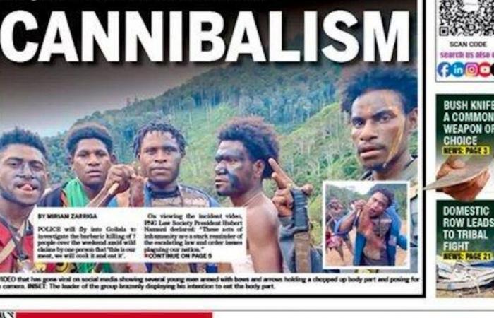 Papua New Guinea: Cannibals on the front page of the newspaper, licking human remains