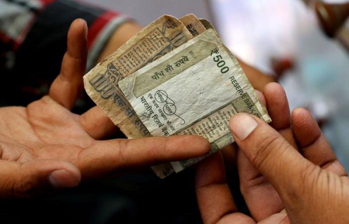 The rupee advances as the dollar’s rise runs out of steam amid back-and-forth tariffs