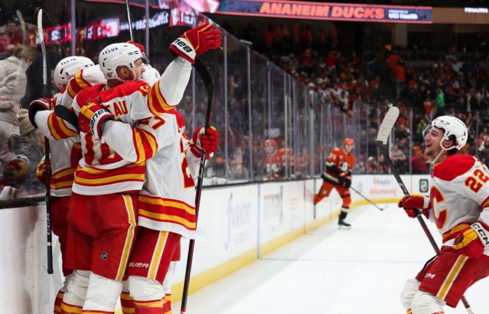 Huberdeau looks at his mother after scoring the winning goal in overtime