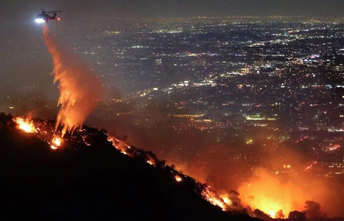 at least five dead, Hollywood evacuates, city surrounded by flames