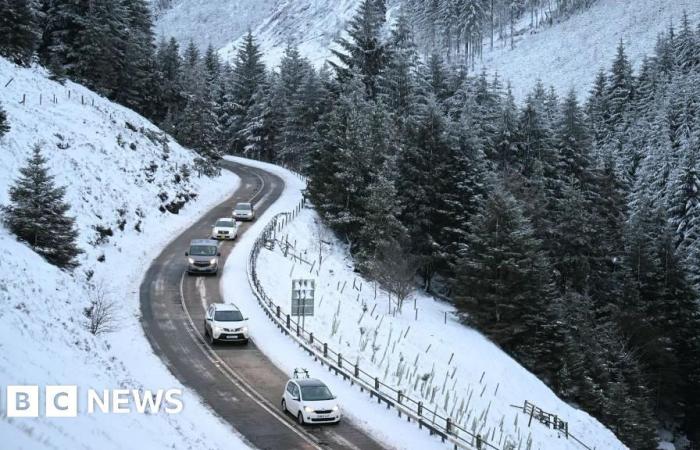 Manchester airport reopens runway after heavy snow