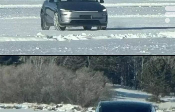 the electric SUV with its face exposed on the ice