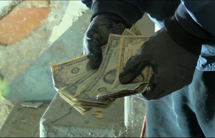 Toledo man finds $10,000 cash buried under basement