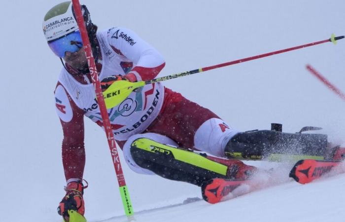 Manuel Feller leads first run of snowy World Cup slalom at Adelboden