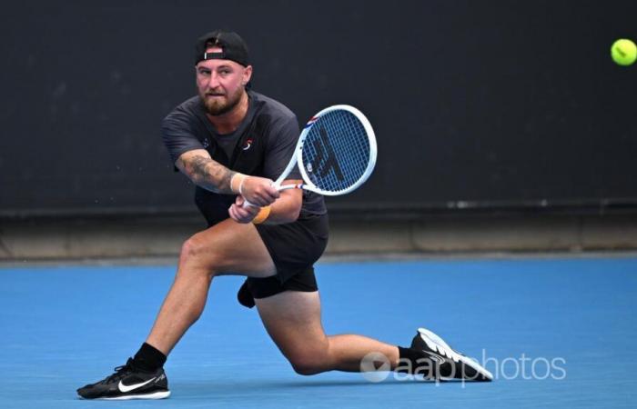 Rain halts play on outside courts at Australian Open – Australian Associated Press