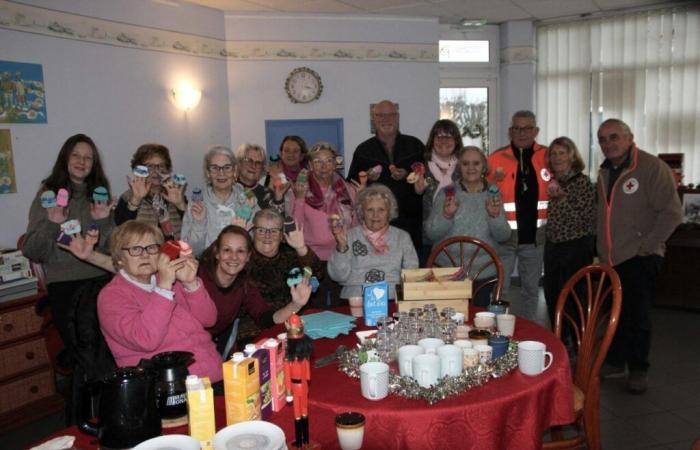 hats, scarves and headbands made by knitters for a good cause