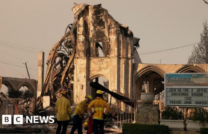 LA crews race to halt wildfires ahead of high winds