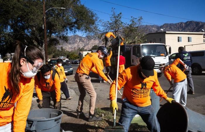 Fires in Los Angeles | Volunteers clean streets littered with charred debris