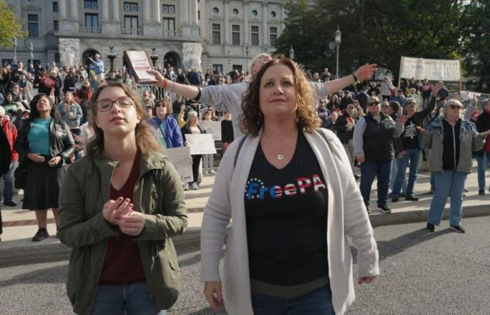 director Auberi Edler films the fight between Democrats and Republicans during a school election in the United States