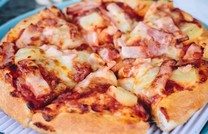 You will have to pay $120 to add pineapple to your pizza in this restaurant