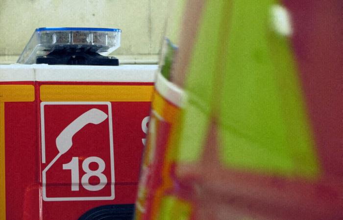 a heavy goods vehicle lying on the roadway, the road cut