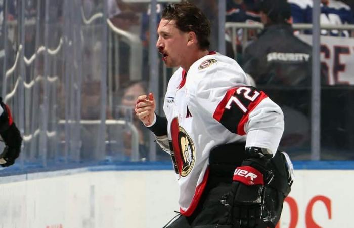 Defender Thomas Chabot receives the puck in the face