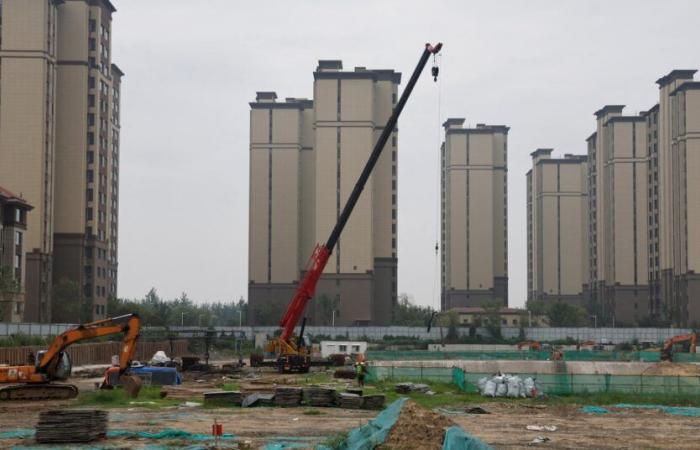 New home prices in China flattened month-on-month for the first time in a year and a half in December due to stimulus measures | Reuters