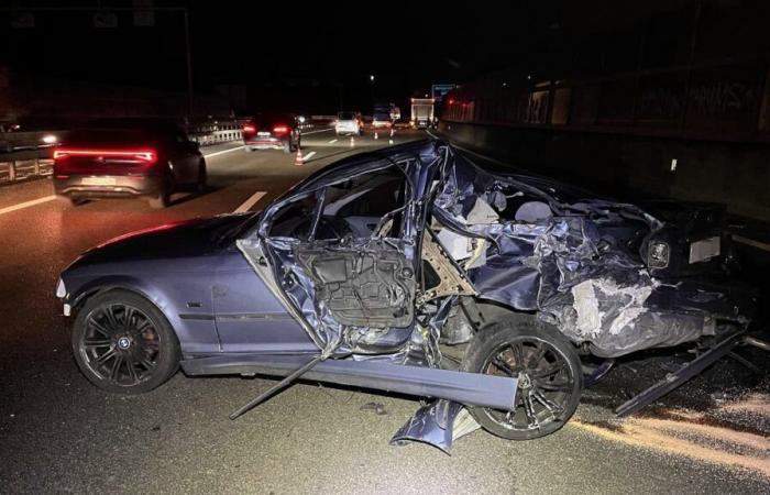 Truck crashes violently into broken down vehicle