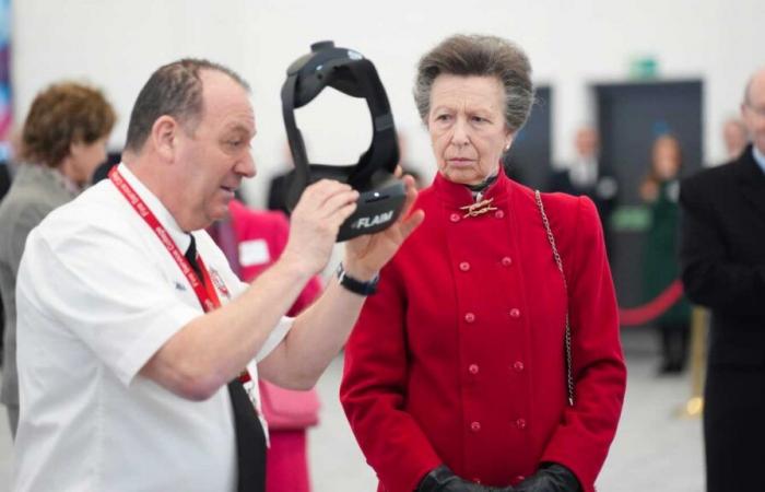 Princess Anne tests a virtual reality fire simulator to train firefighters