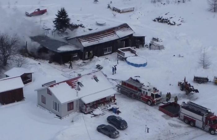 Farm building partially damaged by fire in Sainte-Justine