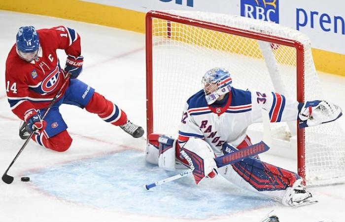 Laine scores in overtime and the Canadian beats the Rangers