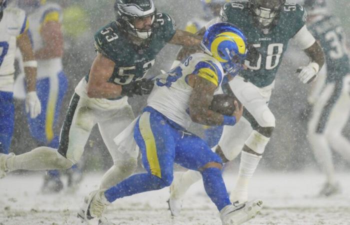 Rams’ fumbles in the snow derail playoff upset bid in Philadelphia