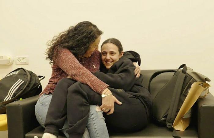 Moving images: the three freed hostages reunite with their mothers