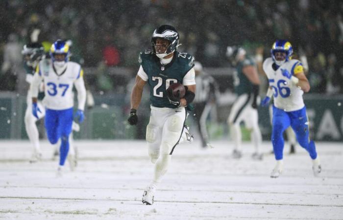 Eagles ride Saquon Barkley heroics, late defensive stand to snowy victory over Rams and NFC title game berth