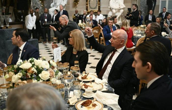 Jeff Bezos locked in conversation with Barron Trump at…