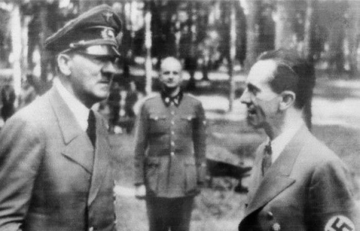 Pro-Nazi Swiss banker François Genoud on stage in Paris