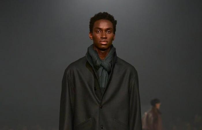 At the Zegna fashion show, actor John Turturro causes a sensation