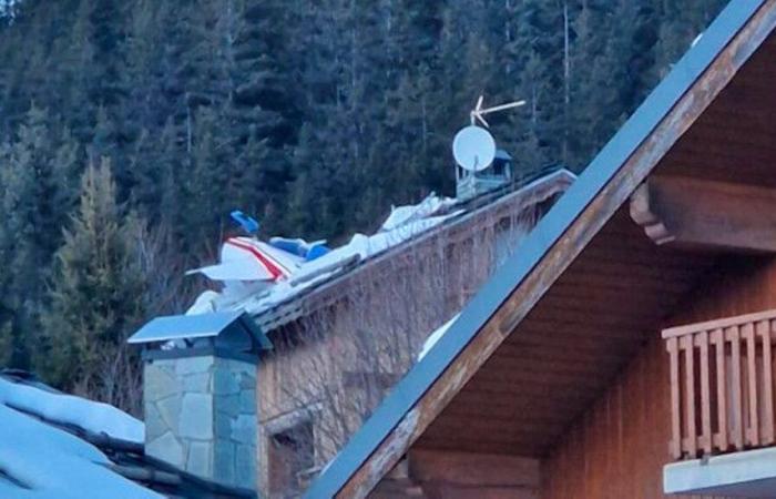 A plane hits a paraglider and crashes on the roof of a chalet